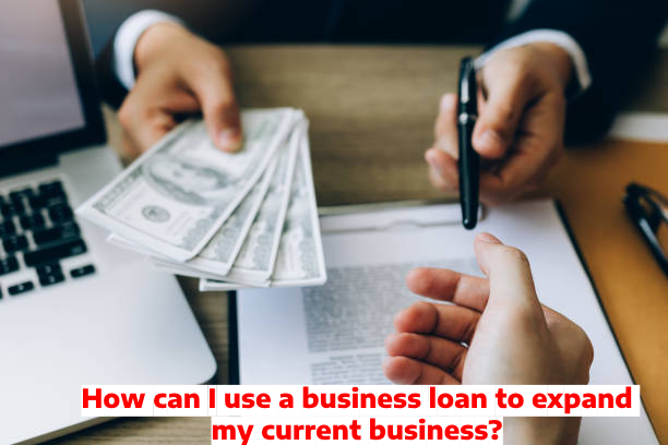 How can I use a business loan to expand my current business?
