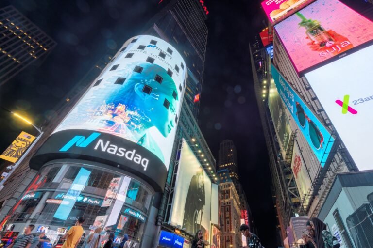 Stock Indexes Settle Higher as Chipmakers Soar
