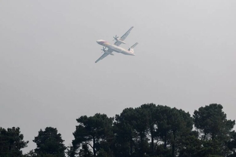 Wildfire rages near Paris as heatwave scorches Europe