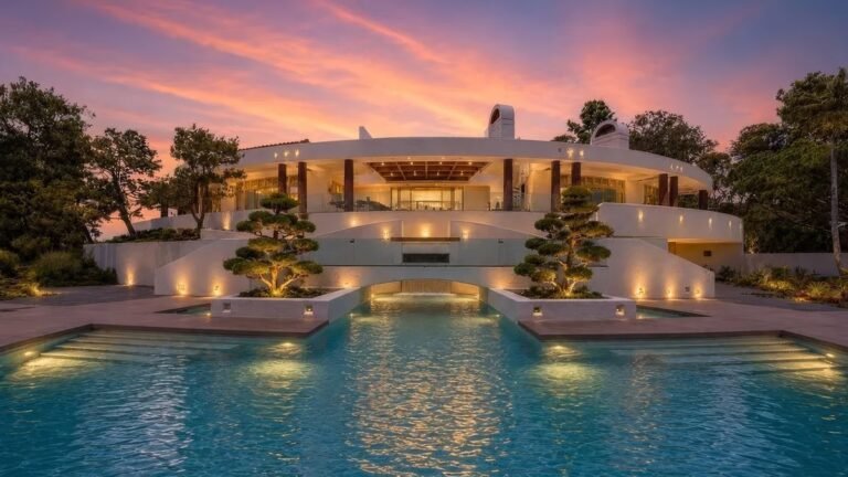 ‘Half Moon-Shaped’ Estate Comes With Flamboyant Pink Tennis Court