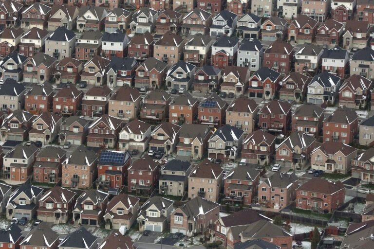 CMHC reports annual pace of housing starts slowed in July