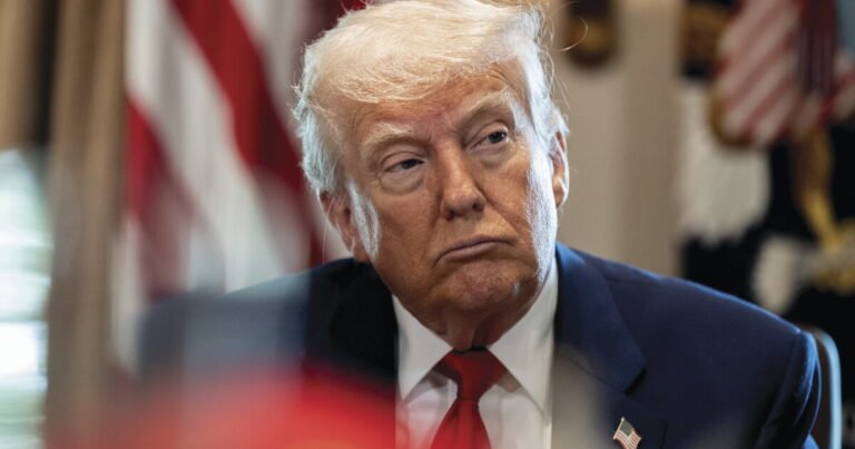 Trump signs bill funding the government through December