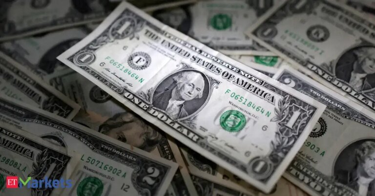 Dollar set for weekly gains as yields surge, Fed bets build