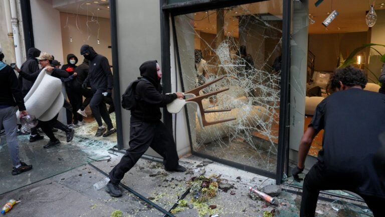 France protests: Curfews calm unrest as Macron tours Gulf